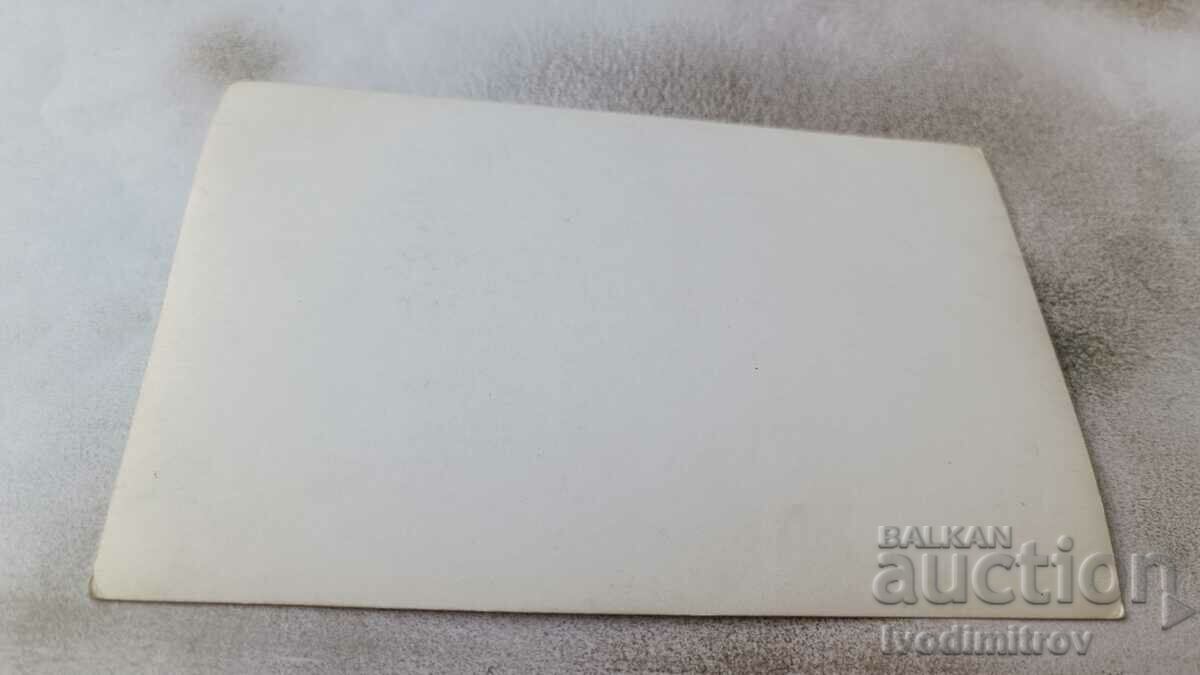 Photo Men and women on a raft in the sea with price 2.35 BGN | € 1.20 Photo Men and women on a raft in the sea with price 2.35 BGN | € 1.20