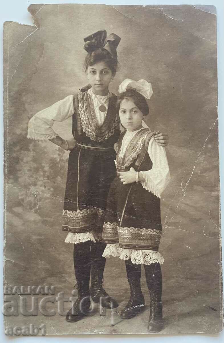 Girls in folk costumes