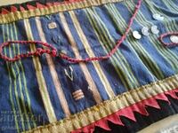 Old apron, gold tinsel, coins, costumes, ethno