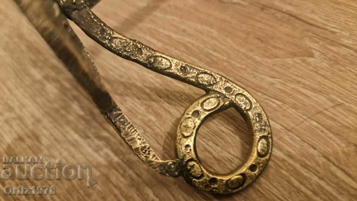 Auction Wrought Pagan Candlestick, Brass. Auction Wrought Pagan Candlestick, Brass.