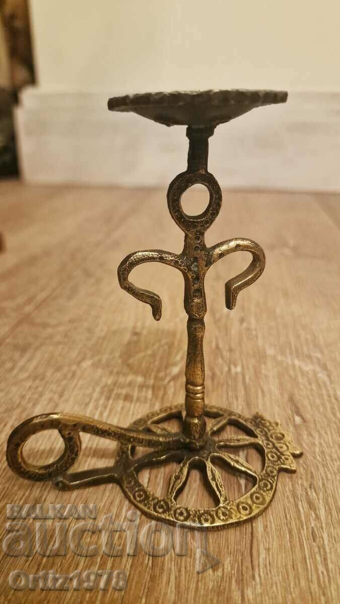 Delivery of Wrought Pagan Candlestick, Brass. Delivery of Wrought Pagan Candlestick, Brass.