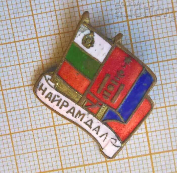 Nairamdal badge