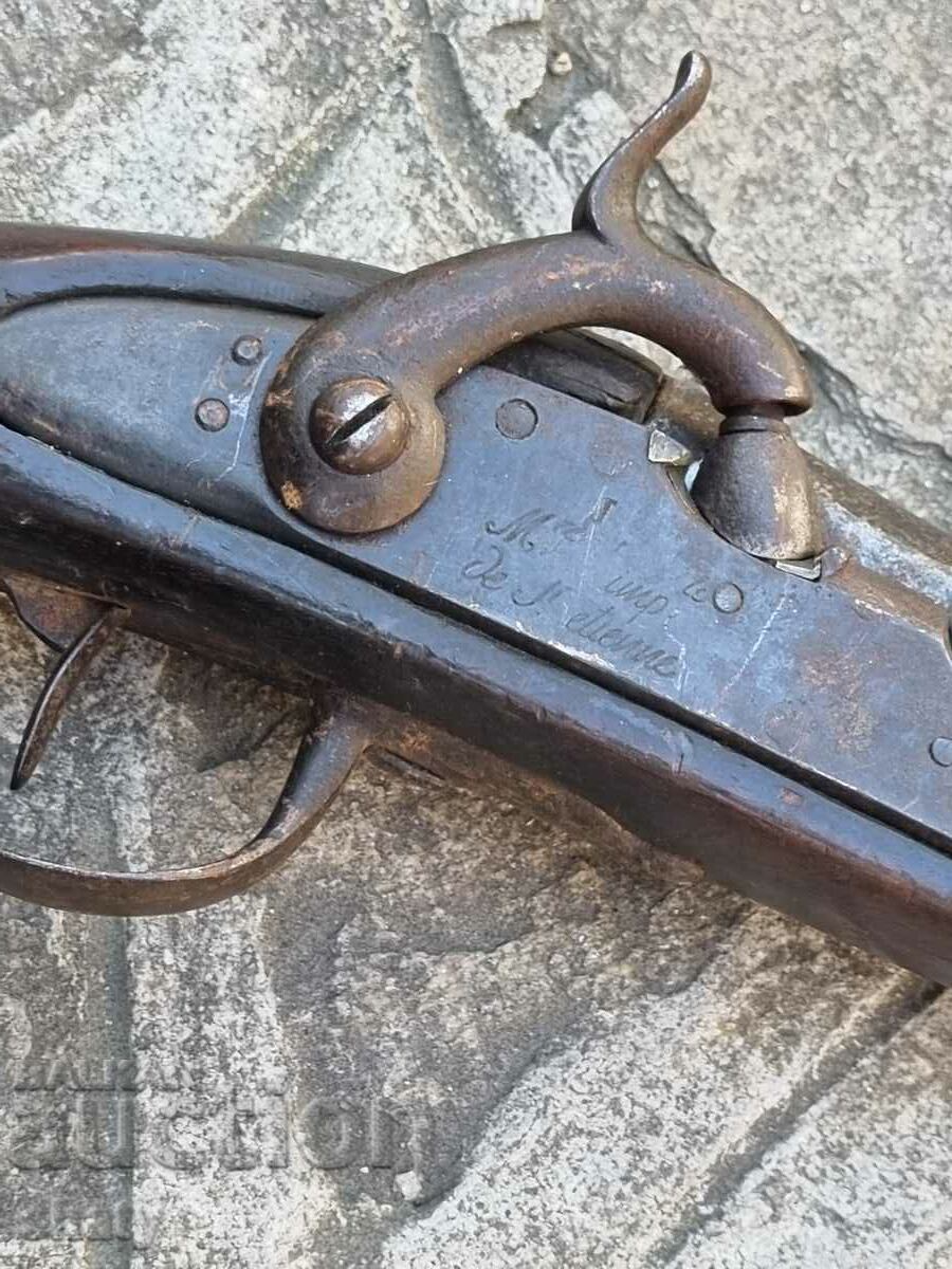 Auction  An old rifle. A musket.
