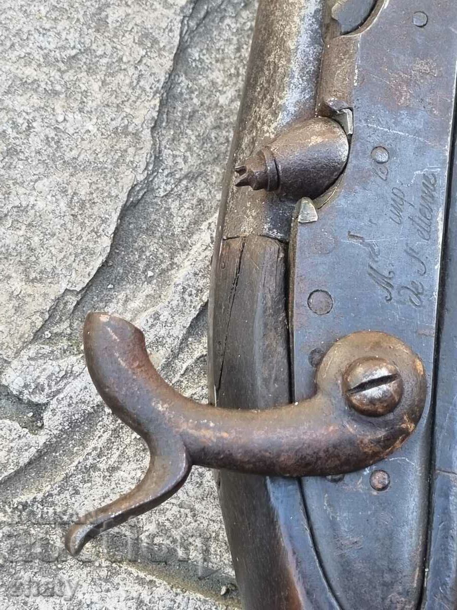 An old rifle. A musket. - 5