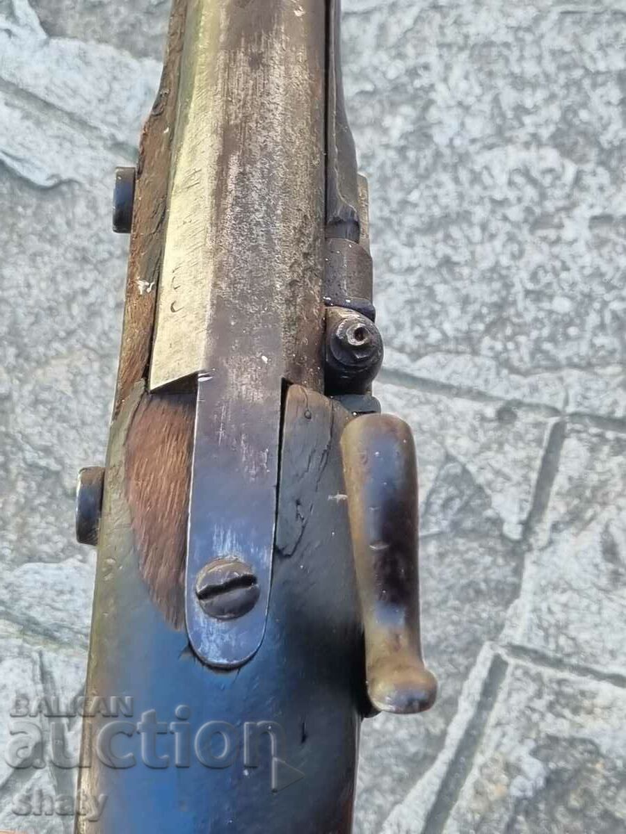 An old rifle. A musket. - 6