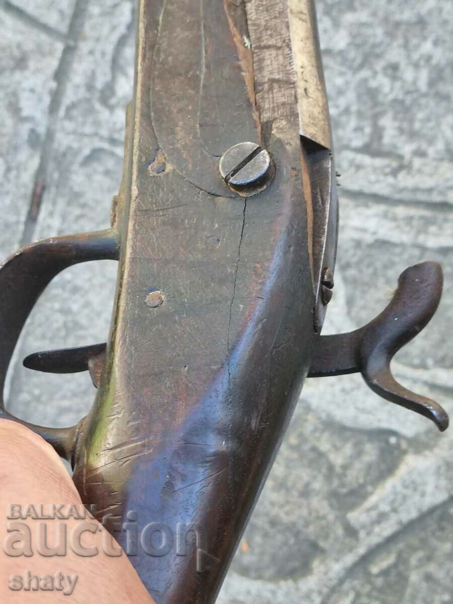 An old rifle. A musket. - 7