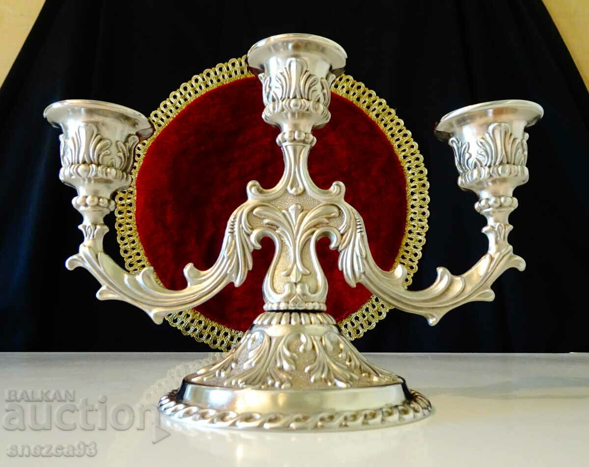Gorgeous silver-plated triple candlestick, baroque.