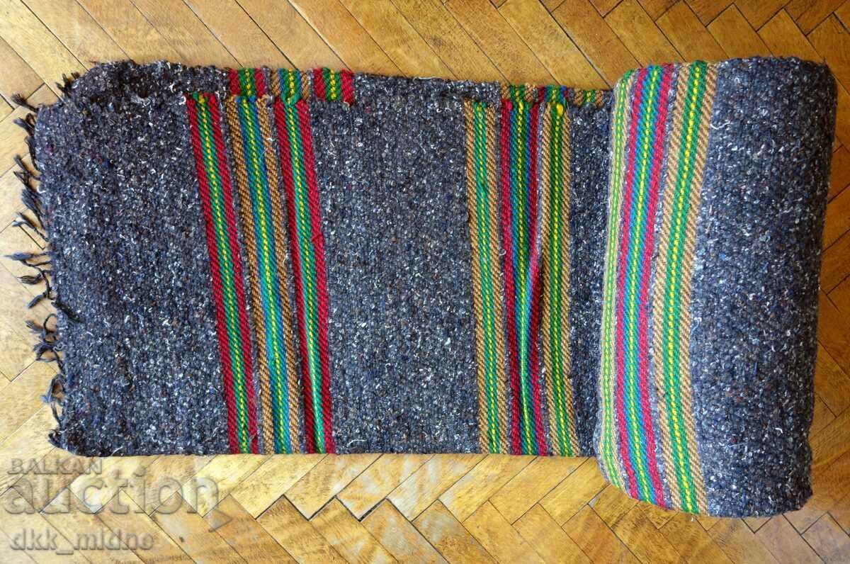 Two handwoven wool rugs - new