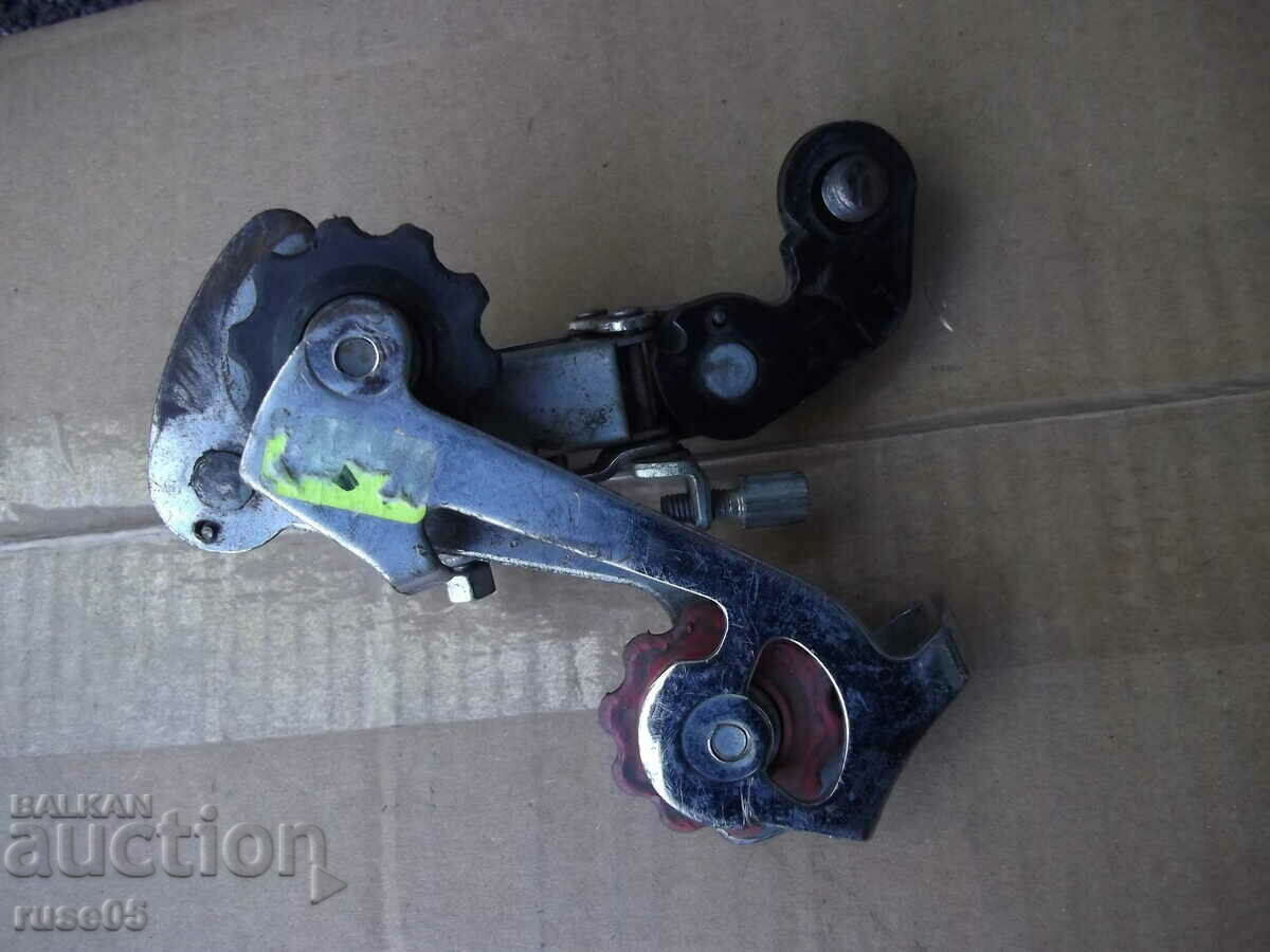 Rear derailleur (tensioner) on a bicycle chain - 5