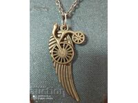 Wheel and wing necklace