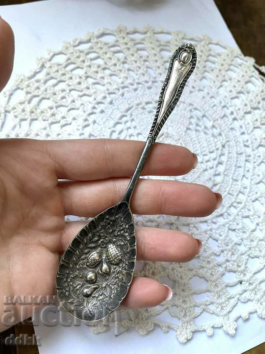 A beautiful silver plated sugar spoon from England