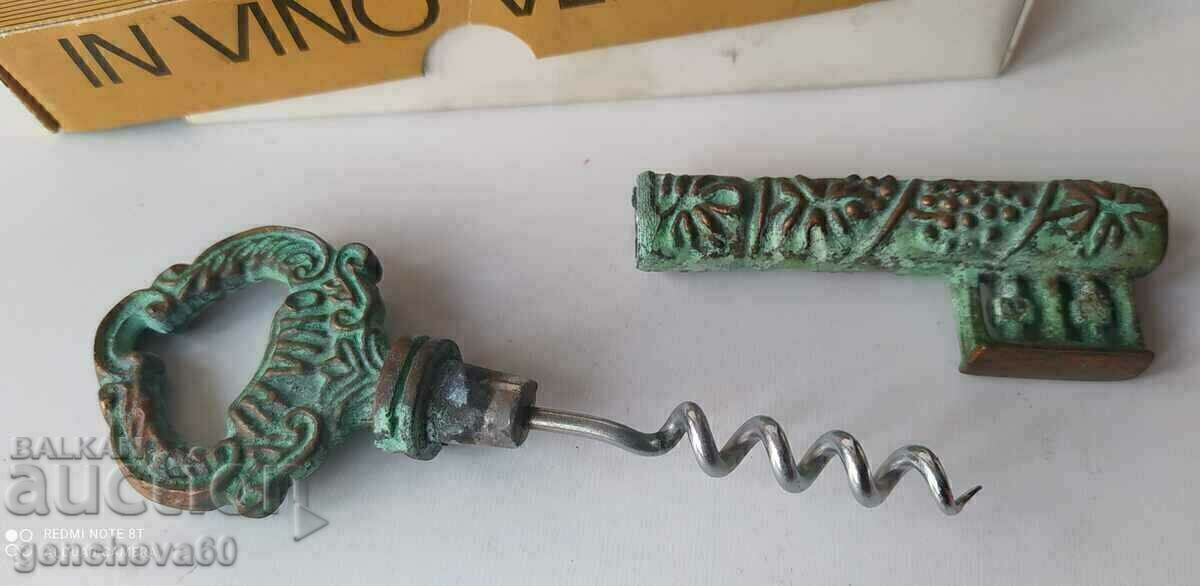 Auction Antique corkscrew, bronze, patina, key in box Auction Antique corkscrew, bronze, patina, key in box