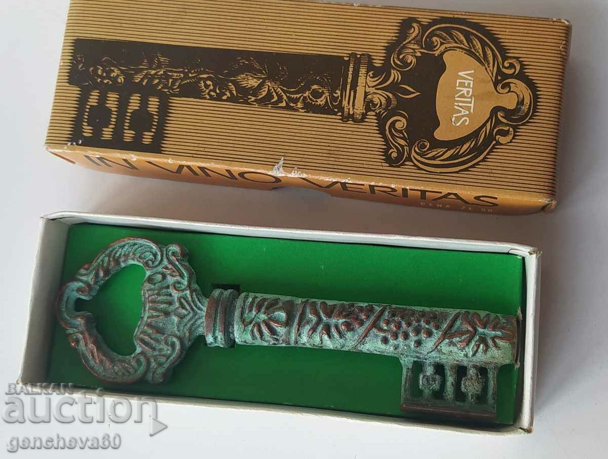 Antique corkscrew, bronze, patina, key in box