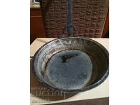 Old copper pan. Sahan