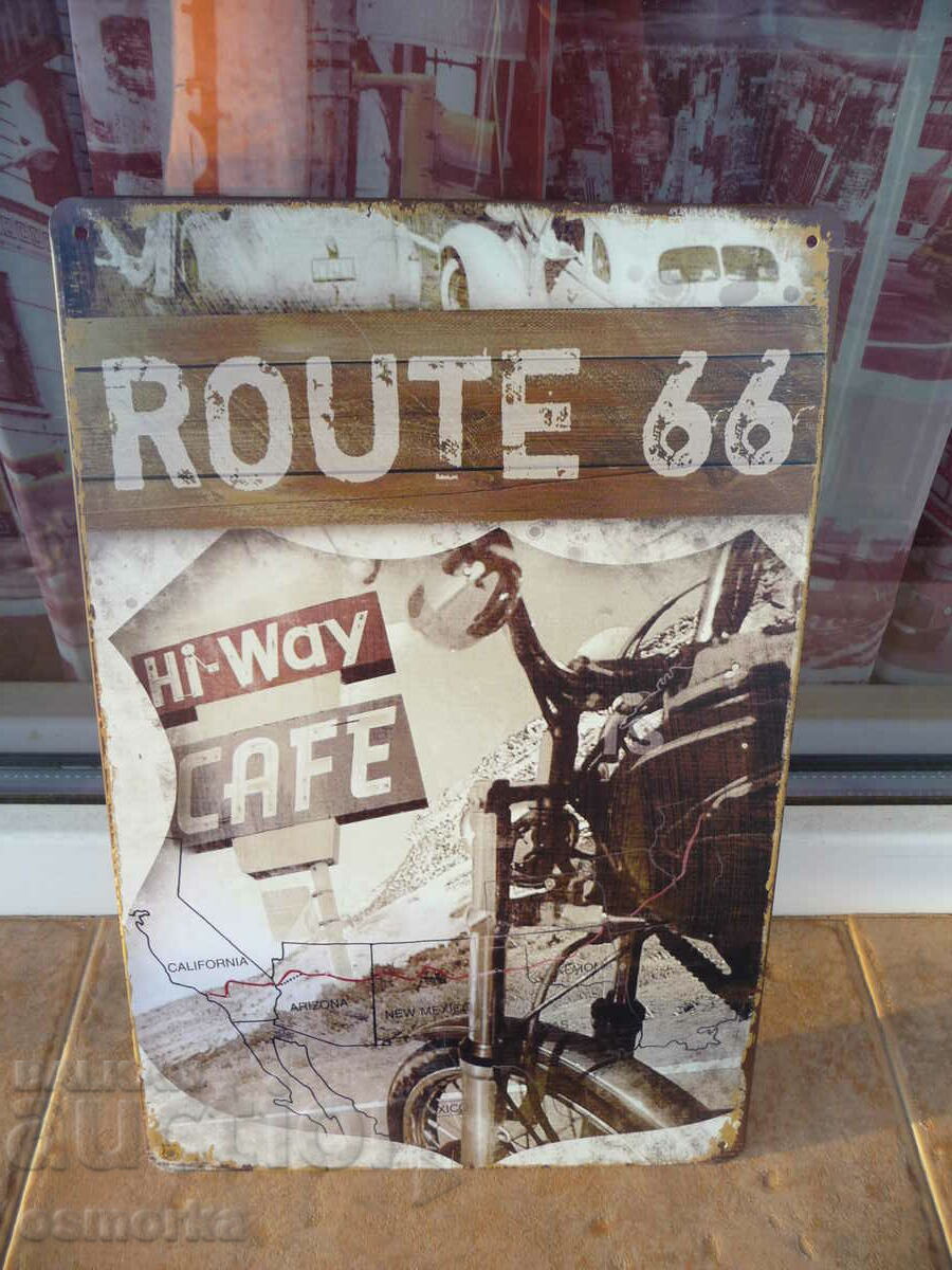 Metal sign motorcycle Route 66 cafe cafe on road horizon road