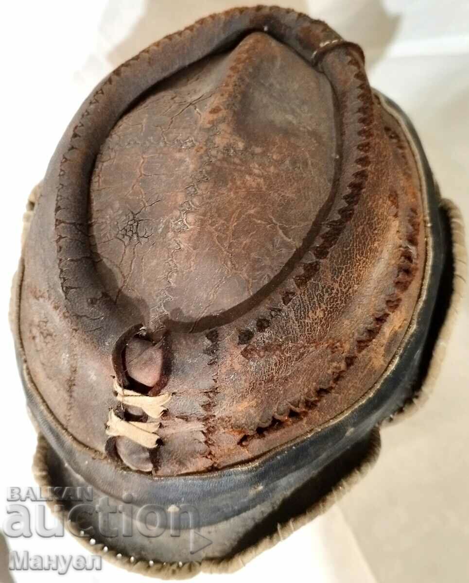 Auction Old leather hat. Auction Old leather hat.