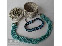 Necklace, bracelet of blue beads for costume in a bead box