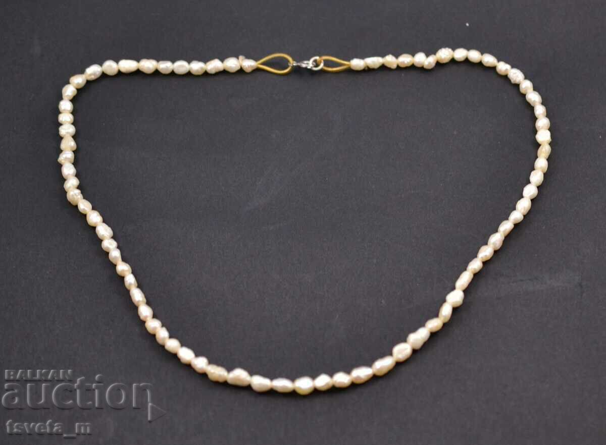 Choker, necklace with natural pearls and silver clasp with price 20.00 BGN | € 10.23 Choker, necklace with natural pearls and silver clasp with price 20.00 BGN | € 10.23