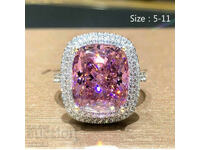 Ring with pink zircon and white topaz