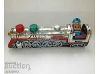 Стара Соц детска ламаринена играчка с батерии локомотив влак
