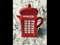 Beautiful teapot phone booth with markings