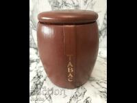 Porcelain jar with leather cover