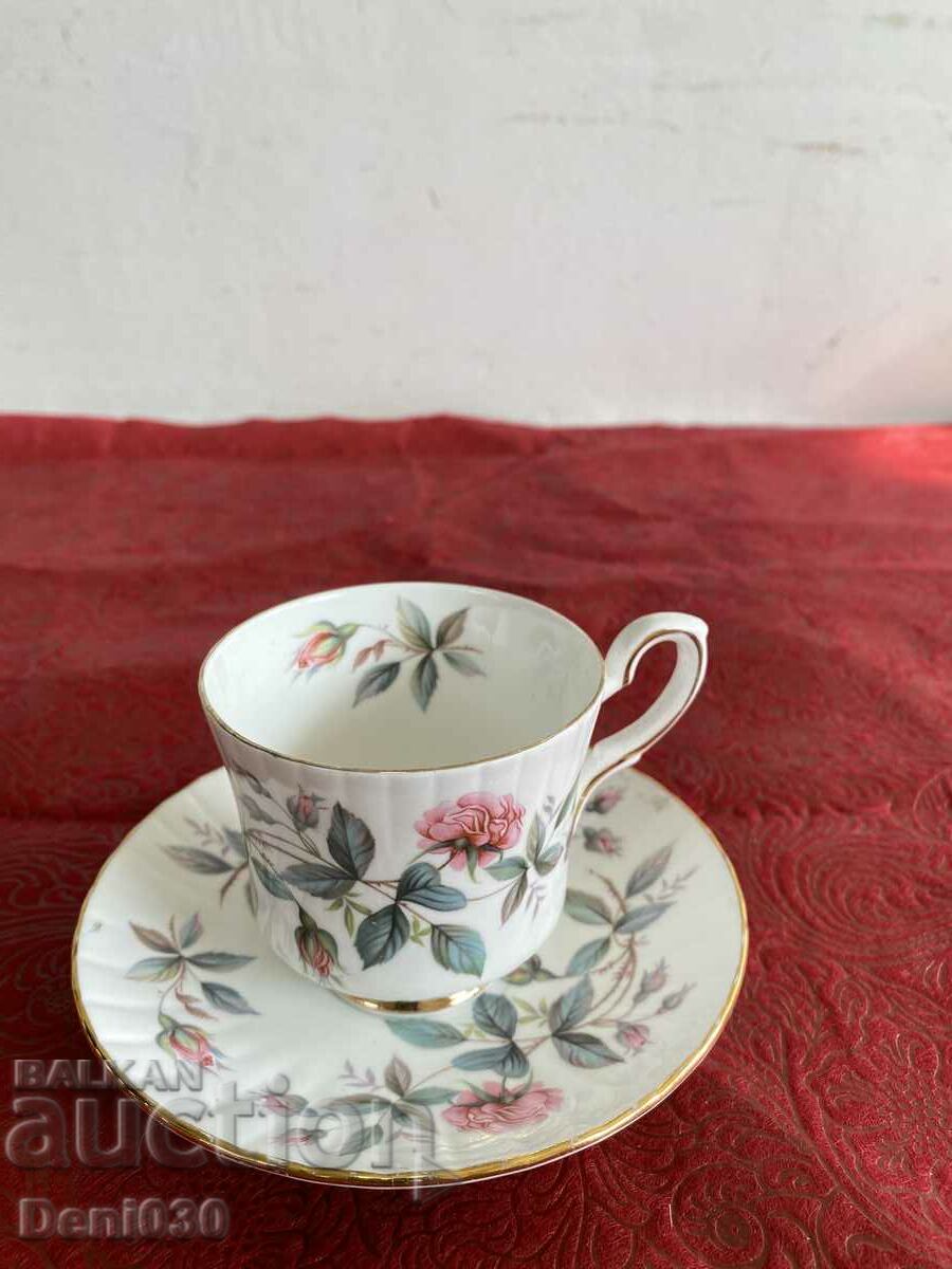 A beautiful English porcelain coffee cup with markings