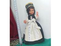 Vintage folkloric doll with blinking eyes