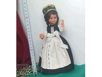 Vintage folkloric doll with blinking eyes