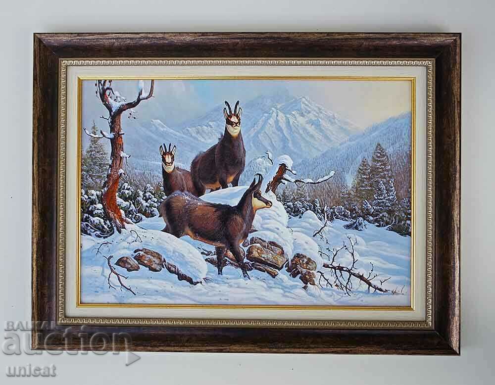 Winter mountain landscape with wild goats, picture for hunters