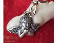 Silver key chain with angel