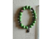 Spectacular women's bracelet with green beads on elastic...