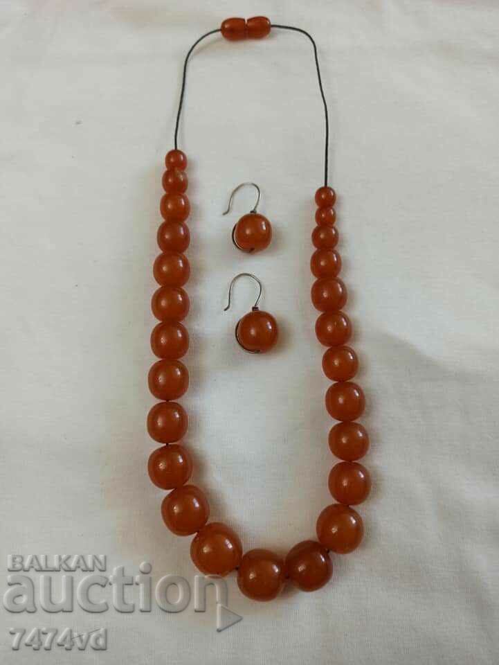 Old Russian amber necklace with round, solid beads and earrings