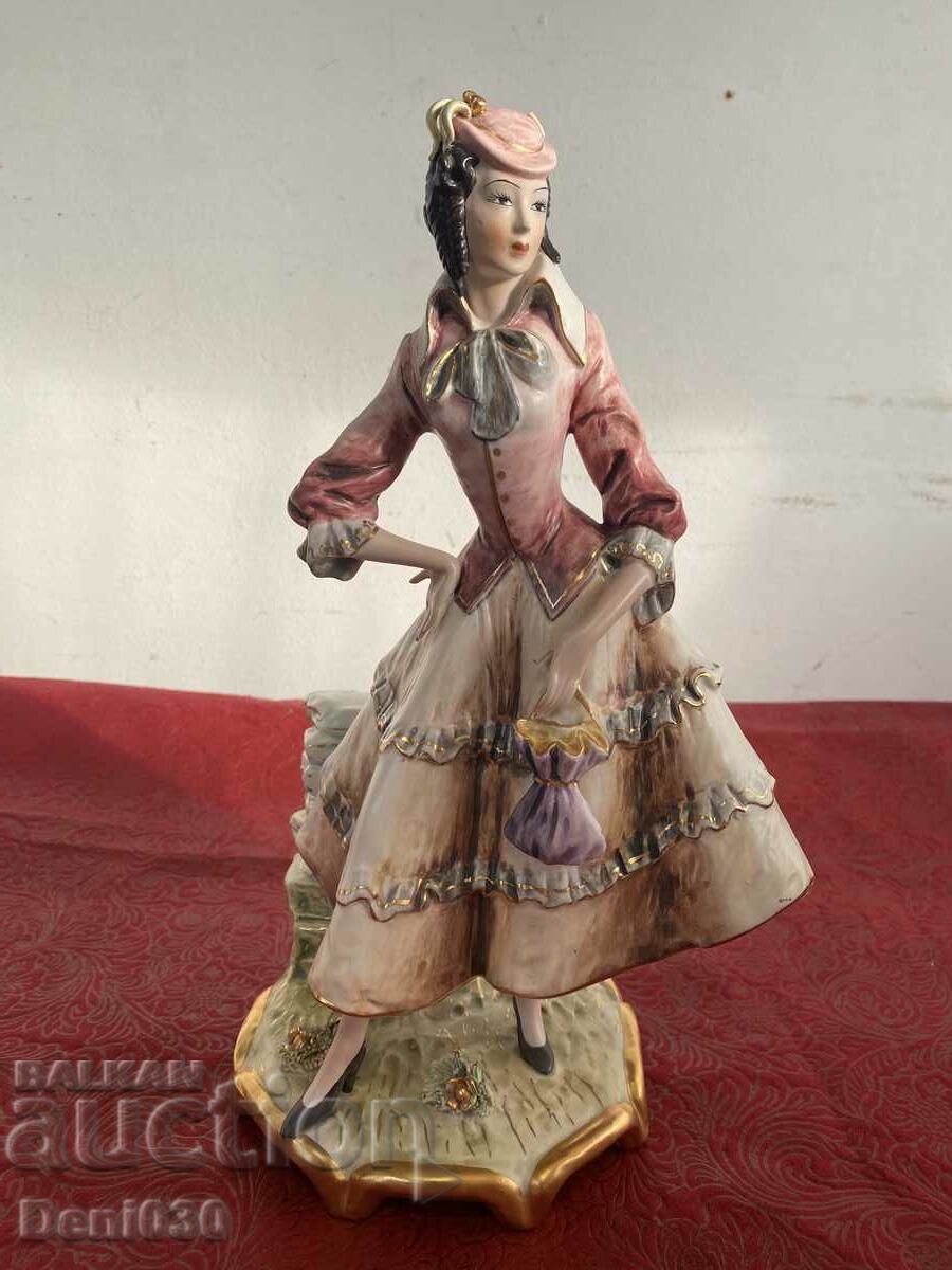 A unique beautiful porcelain figure statuette with markings!