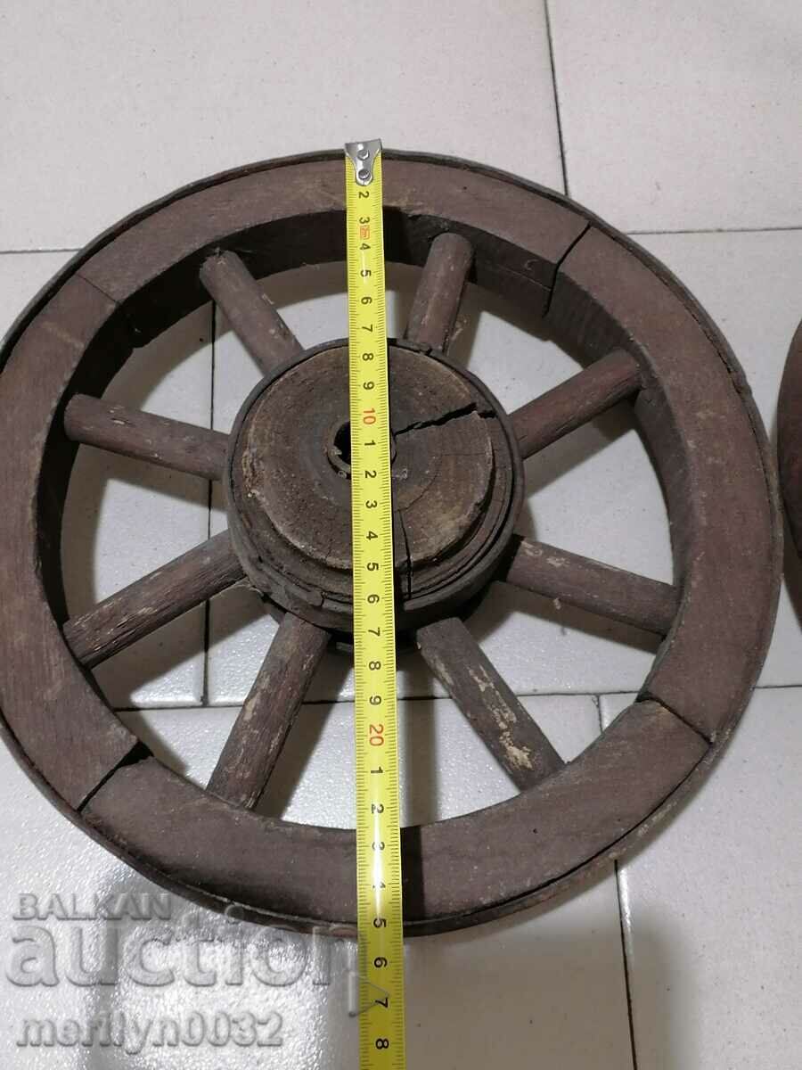 Auction A pair of pram wheels, a wooden pram Auction A pair of pram wheels, a wooden pram