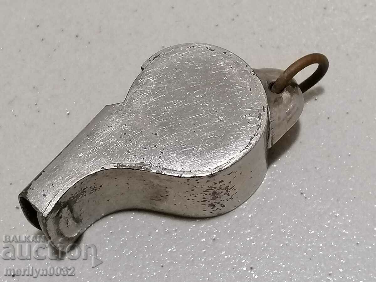 Delivery of Old metal sports referee whistle Delivery of Old metal sports referee whistle