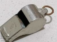 Old metal sports referee whistle