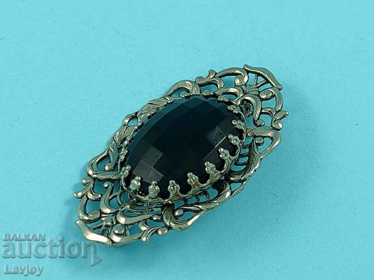 Auction  Old openwork black stone brooch