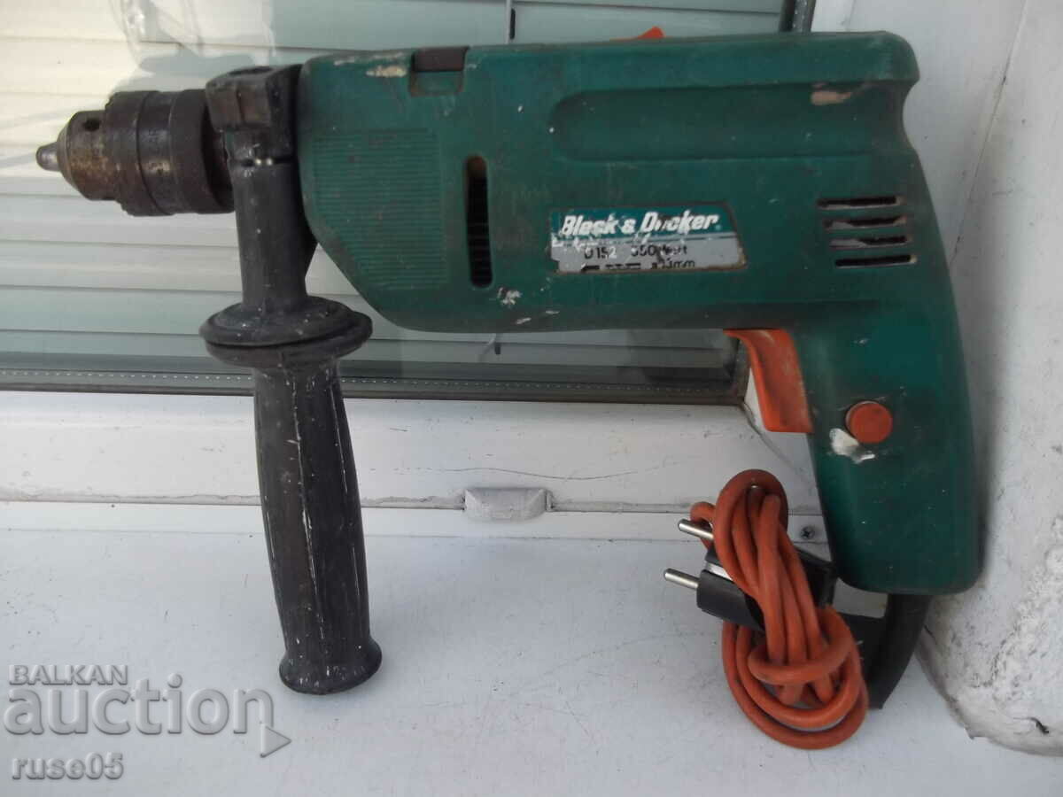 Drill "Black & Decker - D 152" working Drill "Black & Decker - D 152" working