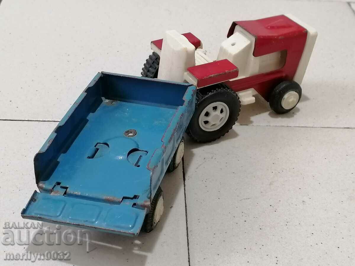 Delivery of Children's tin toy tractor with trailer 70s NRB Delivery of Children's tin toy tractor with trailer 70s NRB