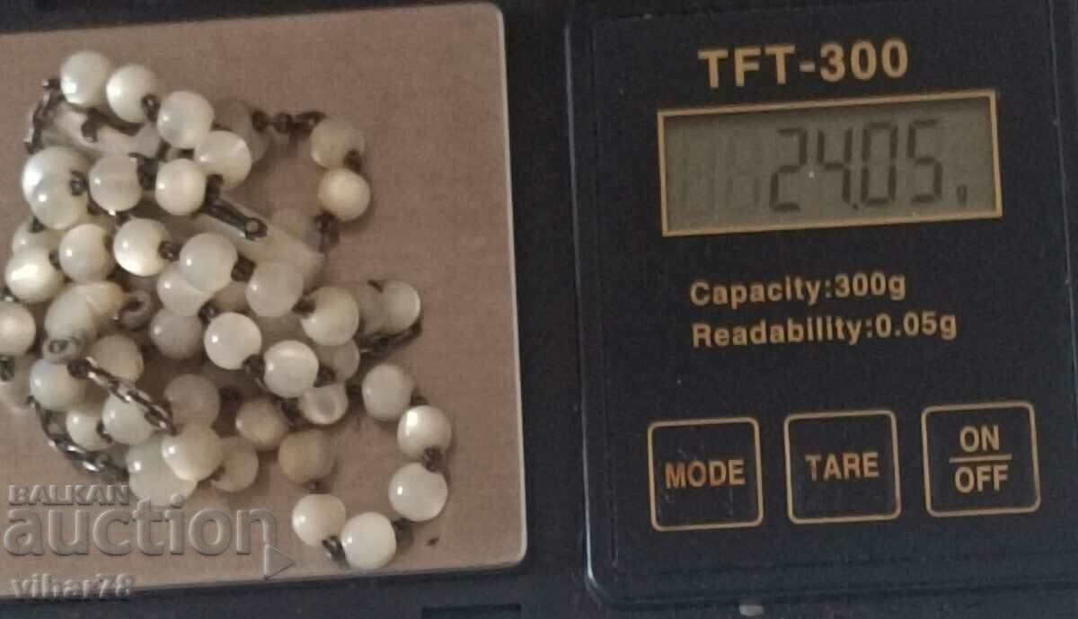 Delivery of Old rosary with mother of pearl