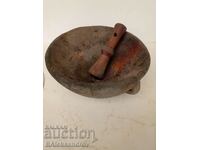 Old wooden bowl with a knocker