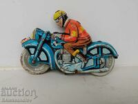 Old tin toy biker