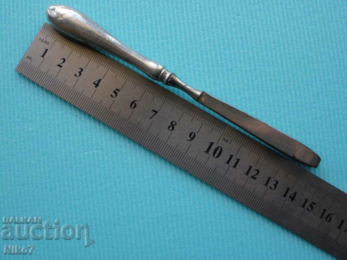 Antique tweezers with a silver handle. - 7