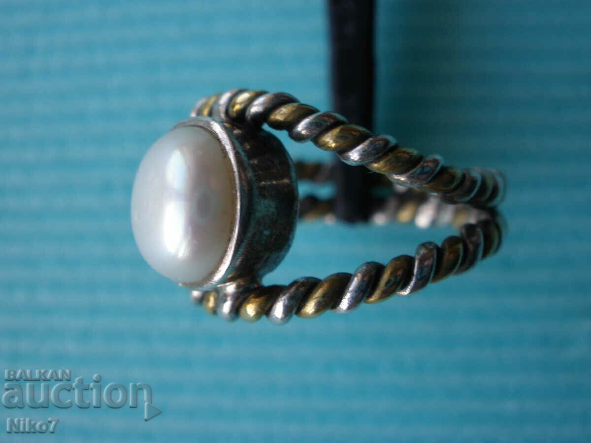 Auction  Old ring-pearl, silver and bronze.