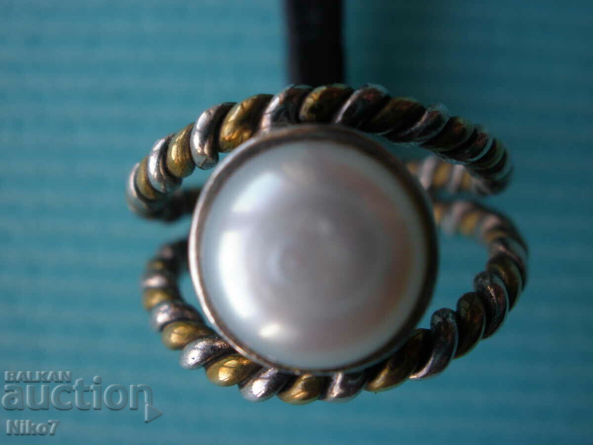 Delivery of Old ring-pearl, silver and bronze.