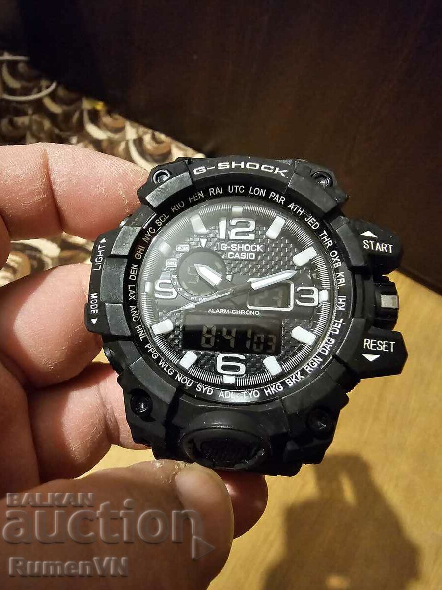 Ανδρικό ρολόι CASIO G-Shock, μαύρη στεφάνη και λουράκι.