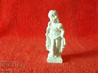 Small figure of a girl maiden dancer