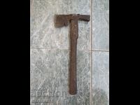 Old ax with a hammer