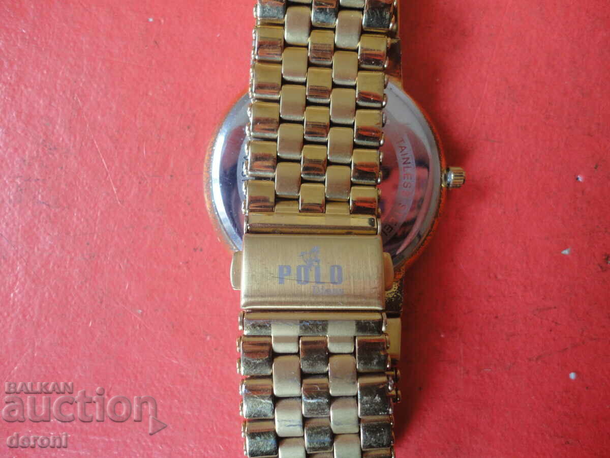 Delivery of Gold-plated Polo Sapphire watch Delivery of Gold-plated Polo Sapphire watch